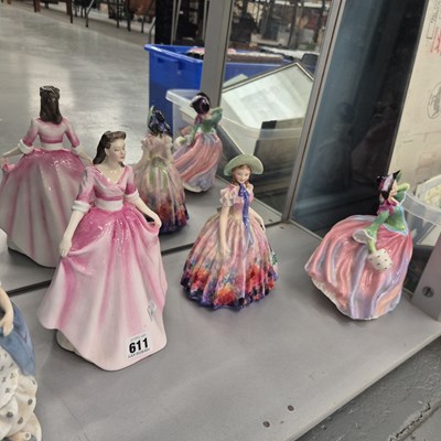 Lot 611 - Four Doulton figures of ladies