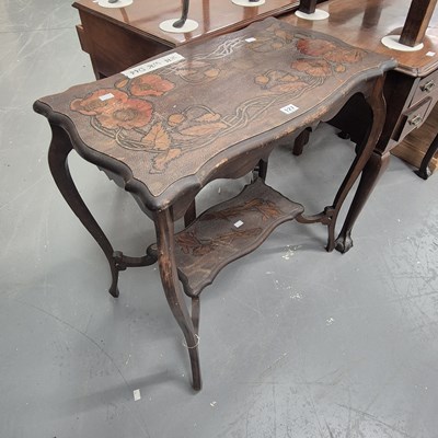 Lot 127 - An antique Art Nouveau serpentine two tier...