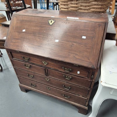 Lot 134 - A 19th century mahogany bureau of five drawers...