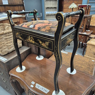 Lot 136 - A Chinoisserie piano stool with scrolled arms...