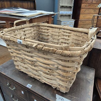 Lot 138 - A large woven wood slat handled basket