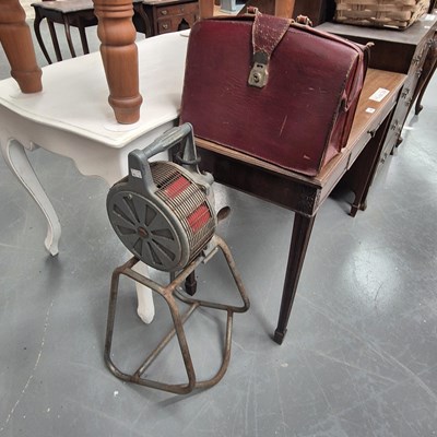Lot 141 - A vintage hand cranked warning siren together...