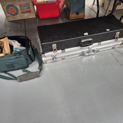Lot 677 - Two rifle cases, three shotgun sleeves,...