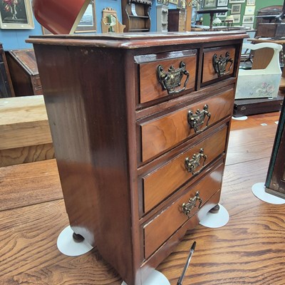 Lot 158 - A miniature 20th century mahogany chest of two...