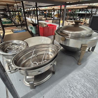 Lot 687 - A pair of steel chafing saucepans, together...