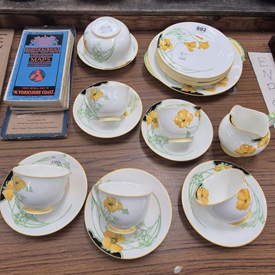 Lot 693 - A Doulton tea set together with folding maps