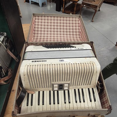 Lot 165 - A vintage cased Hohner Arietta IM bass piano...