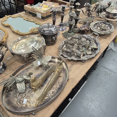 Lot 707 - Electroplate: candelabra, oval trays, an urn...