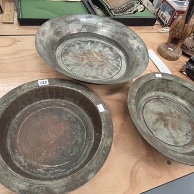 Lot 722 - Three Middle Eastern tinned copper dishes
