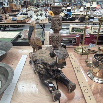Lot 724 - An Indian jewelled black lacquer reclining...
