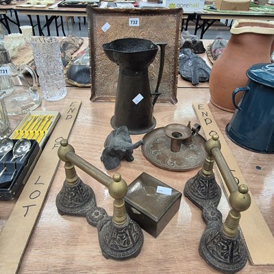 Lot 732 - A pair of Christopher Dresser style fire dogs,...