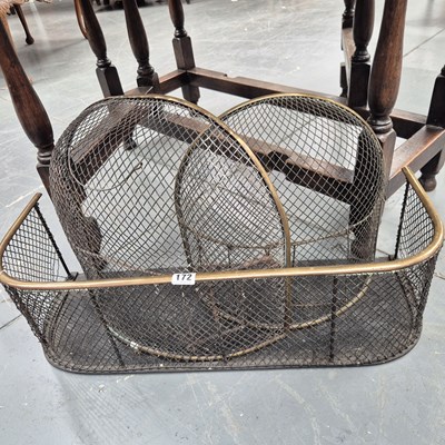 Lot 172 - Two brass and wire fire guards together with a...