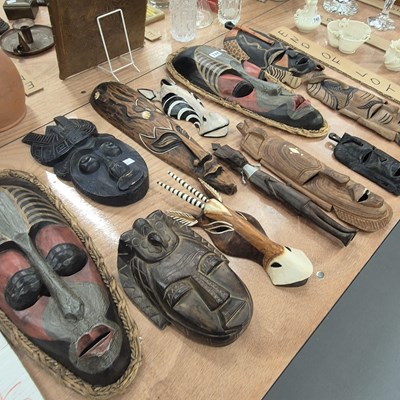 Lot 744 - A collection of ethnic carved wood masks
