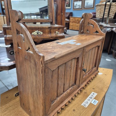 Lot 174 - A small Victorian pitch pine two door wall...