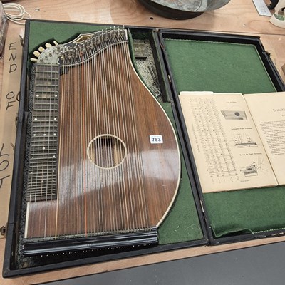 Lot 753 - A cased Glier zither, together with a book of...