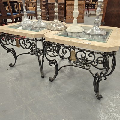 Lot 189 - A pair of wrought iron and travertine lamp...