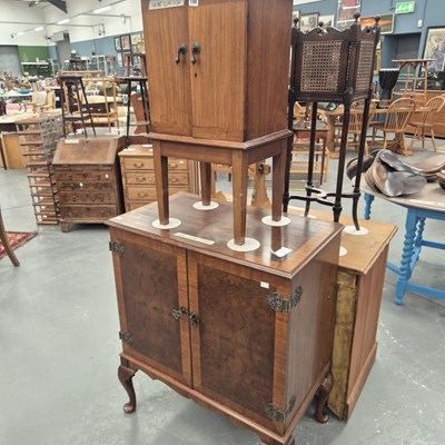 Lot 190 - A mid 1900s two door cabinet on cabriole legs...