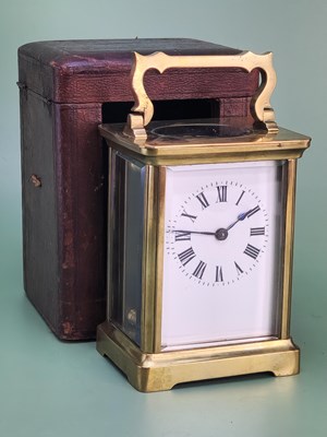 Lot 1534 - A leather cased French carriage time piece,...