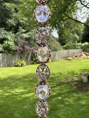 Lot 1156 - A mid-19th-century sapphire and ruby bracelet:...