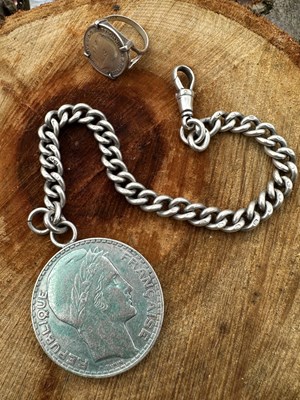 Lot 1192 - A group of silver jewellery and accessories: a...