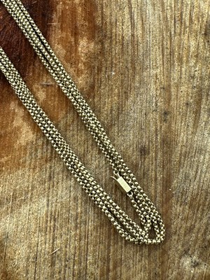 Lot 1157 - A late 19th century unhallmarked guard chain,...