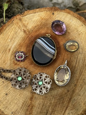 Lot 1096 - A 19th century pearl and ruby cluster brooch,...
