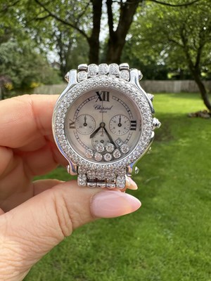 Lot 1205 - A Chopard Happy Sport diamond-set chronograph...