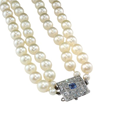 Lot 1228 - A two-row cultured pearl necklace, composed of...