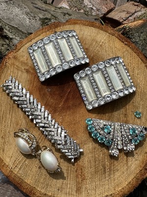 Lot 1230 - A collection of costume jewellery; a Crown...