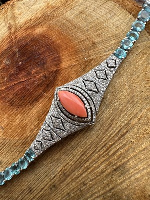 Lot 1235 - An Art Deco-style bracelet, the coral-set...