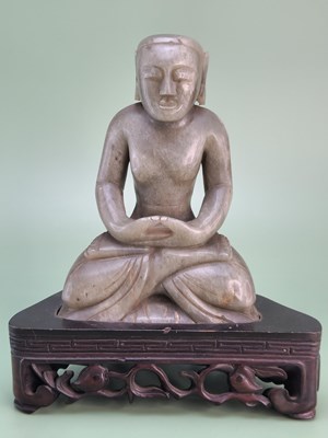 Lot 1537 - A Chinese nephrite jade carving of the Buddha...