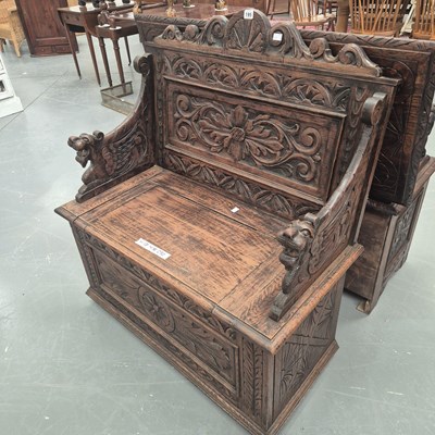 Lot 195 - A 19th century carved oak box settle H 108 W...