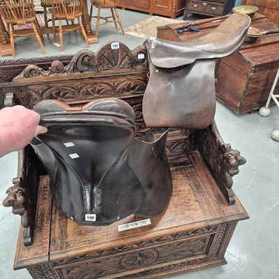 Lot 196 - A vintage horse saddle in dark leather