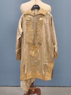 Lot 1542 - An Ottoman mushroom silk kaftan, matching...