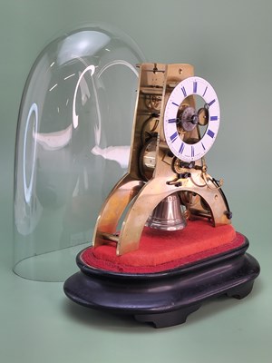 Lot 1545 - A fusee skeleton clock under a glass dome, the...