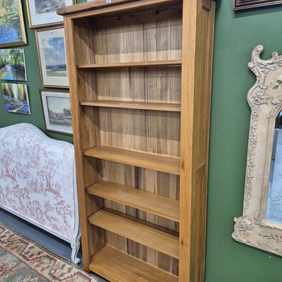 Lot 291 - An oak open bookcase  H 202 W 99 D 32cm