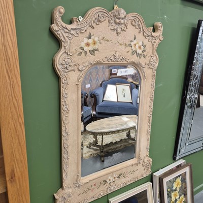 Lot 293 - A French style mirror with ornate moulding and...