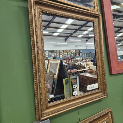 Lot 297 - A mirror in a gilt swept frame 76 × 66cm