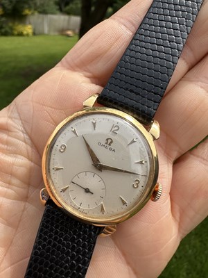 Lot 1239 - An Omega manual-wind wristwatch, the signed...