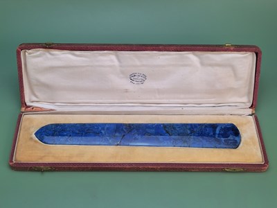 Lot 1762 - A Brazilian Lapis Lazuli page-turner in...