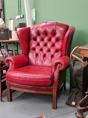Lot 1807 - A Vintage red leather button upholstered...