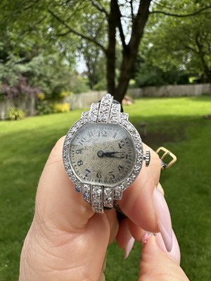 Lot 1245 - An Art Deco platinum and diamond cocktail...
