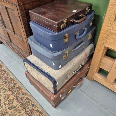 Lot 303 - Four vintage suitcases and a briefcase