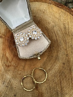Lot 1255 - A pair of vintage Indian gold and white stone...