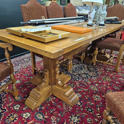 Lot 311 - An impressive bespoke oak dining table, the...