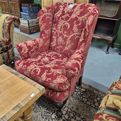 Lot 314 - An antique wing back arm chair on cabriole...