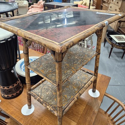 Lot 201 - An antique bamboo table with a lacquered top...