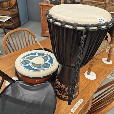 Lot 203 - Drums; a bodhran and a Congo djembe