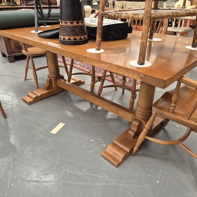Lot 204 - An oak refectory table, the cleated four plank...