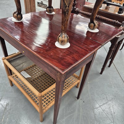 Lot 207 - A George III mahogany foldover tea table with...